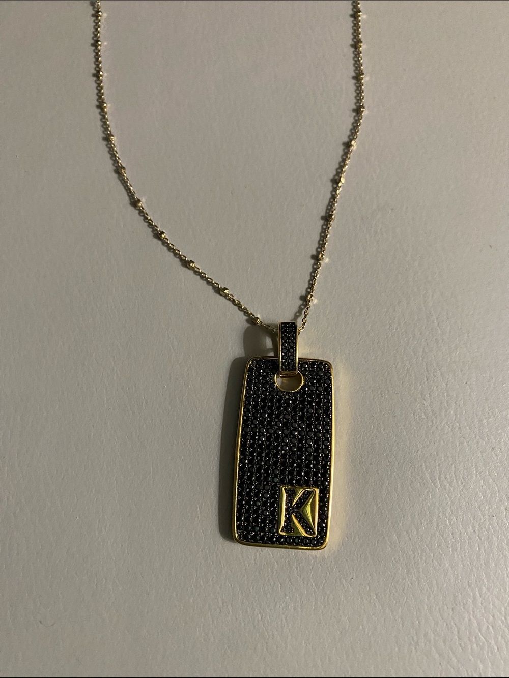 Gold Tone Black Pavé 'K' Initial Pendant Necklace
